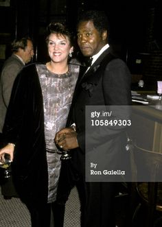 Georg Stanford Brown and wife.  
