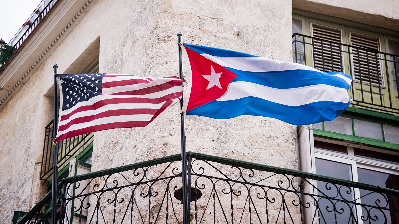 US and Cuban flags side by side in Havana, Cuba The History, Culture
